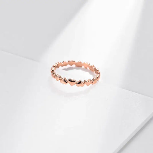 Close-up of 18K gold plated heart-shaped ring