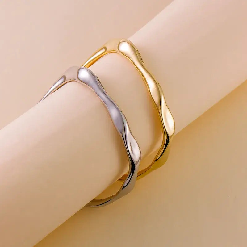 Gold Geometric Bracelet worn on wrist for casual outfit