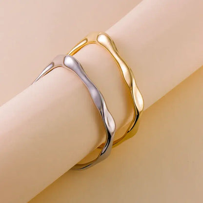 Gold Geometric Bracelet worn on wrist for casual outfit