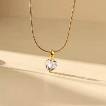 Woman wearing zircon gold-plated necklace with elegant outfit