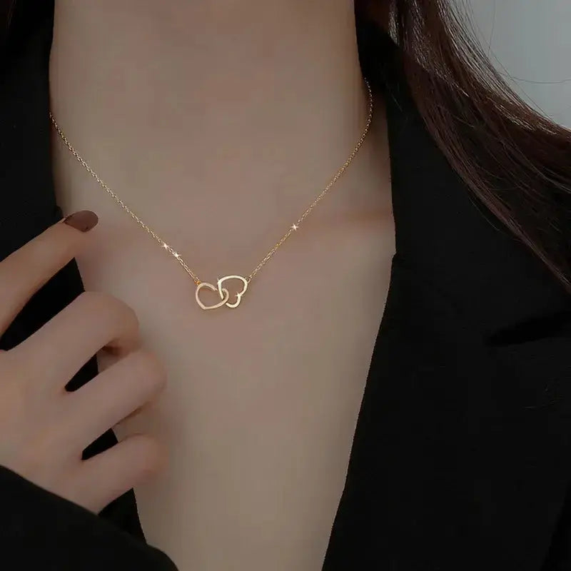 Close-up of Minimalist Heart Necklace showing gold plating and heart design