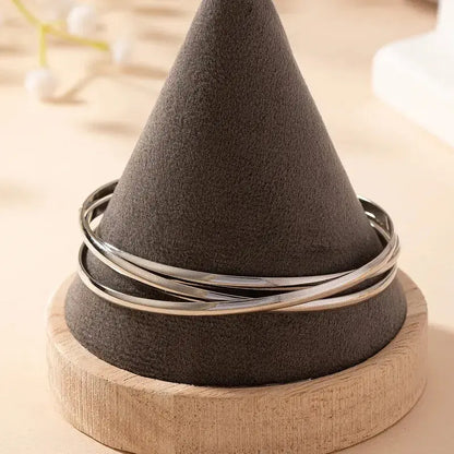 Side view of Simple Style Solid Color Iron Bangle highlighting solid color design