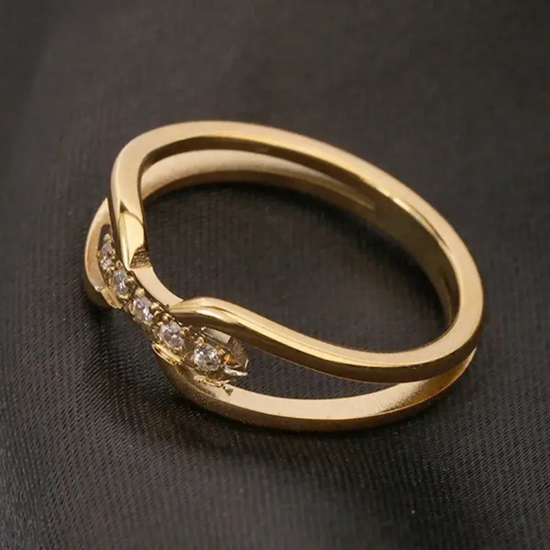 Stacked rings featuring 18K gold plated stainless steel ring