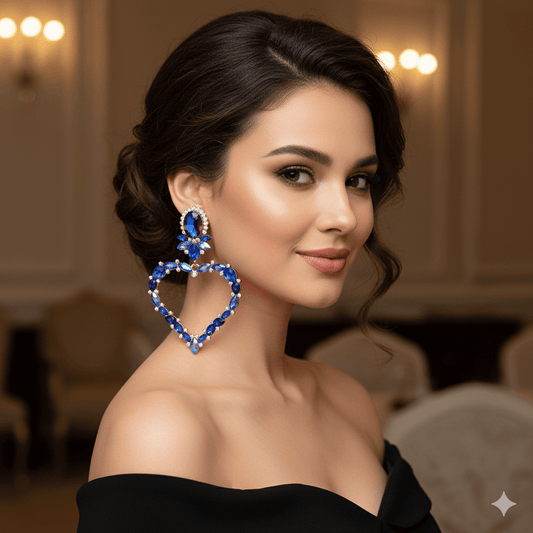 Luxurious heart-shaped drop earrings worn by a model showcasing elegance and sparkle in a formal setting.