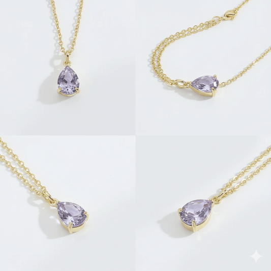 Vintage water drop pendant necklace showcasing a polished water drop design with lavender gemstone and gold chain.