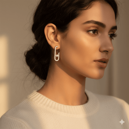 Geometric hairpin stud earrings featured on a model showcasing their minimalist elegance and luxurious design.