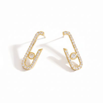 Geometric hairpin stud earrings in 18K gold with white stones, featuring a unique paper clip design.