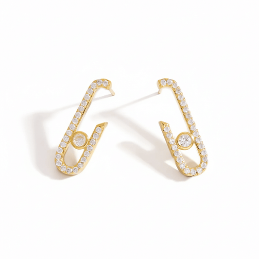Geometric hairpin stud earrings in 18K gold with white stones, featuring a unique paper clip design.