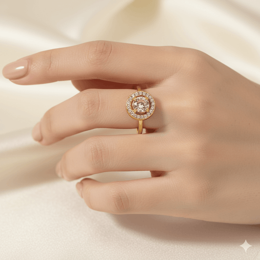 18K gold plated ring displayed on a woman's hand, elegantly highlighting its sparkling zircon inlays.